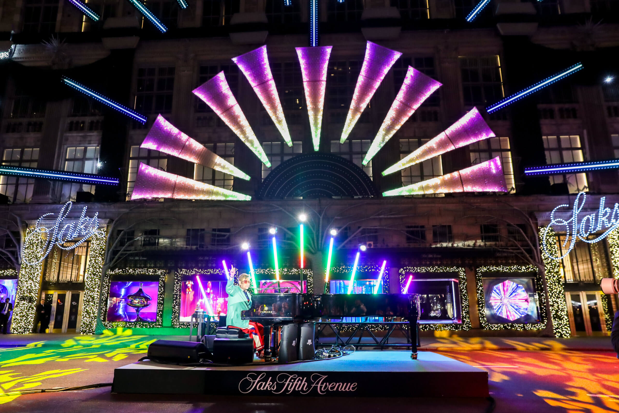 Sir Elton John kicks off holiday season at Saks Fifth Avenue window  unveiling and light show