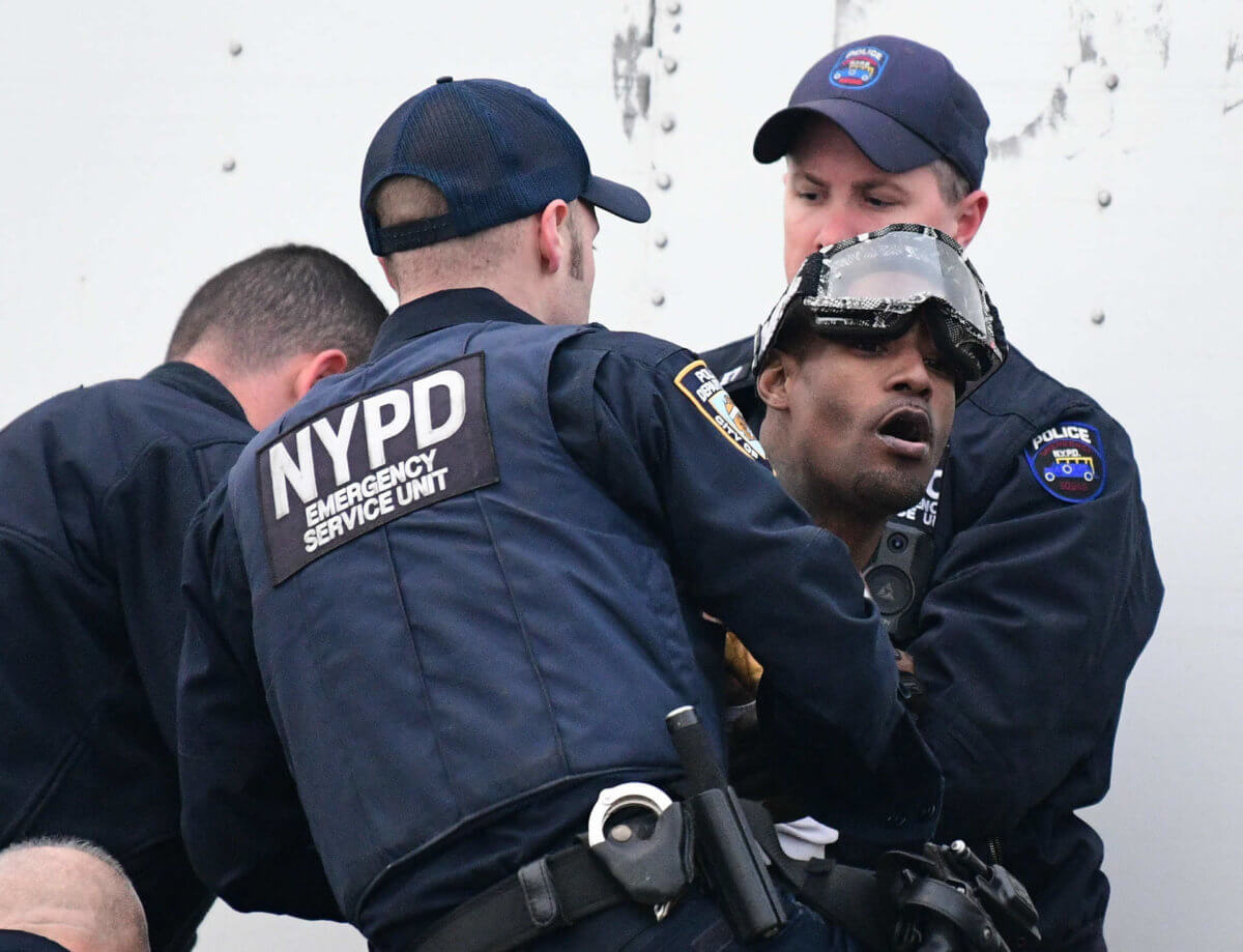 Police Save Brooklyn Man Threatening To Jump From Top Of Truck | AmNewYork