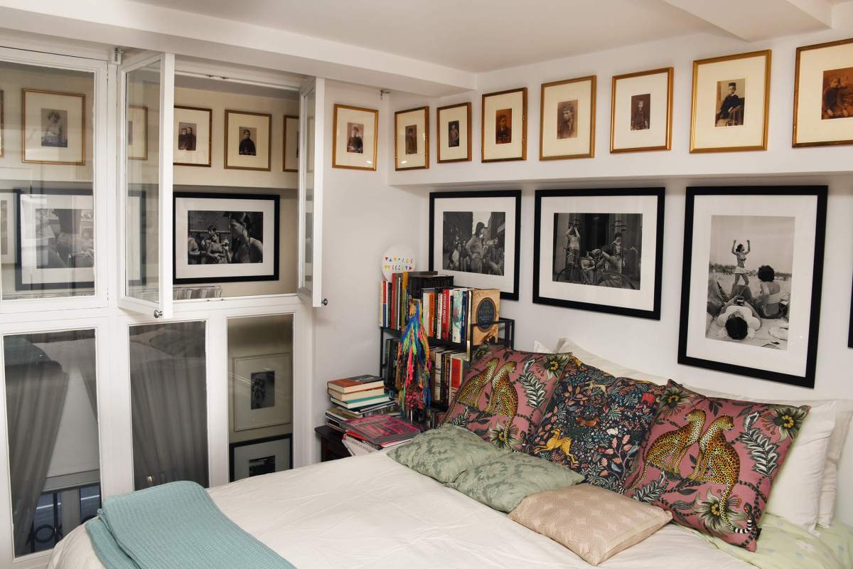 The guest bedroom contains selections from Susan Meiselas' "Prince Street Girls" and a batch of the Leicester orphans