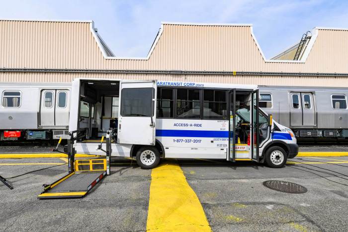 An Access-a-Ride blue-and-white van in Coney Island