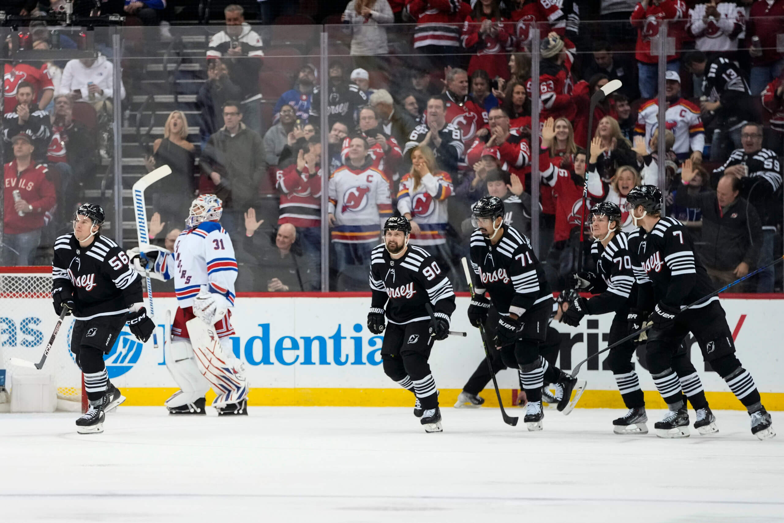 Devils' Jack Hughes plans to work - and eat - his way to big