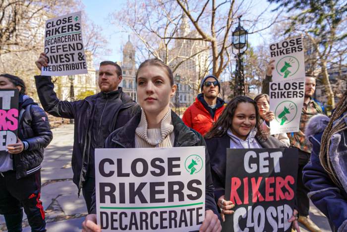 Criminal justice advocates calling for the closure of Rikers Island by the legally mandated 2027 deadline at a City Hall Park rally