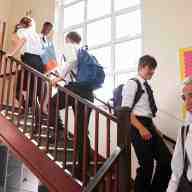 Students walking down staircase at Charter school