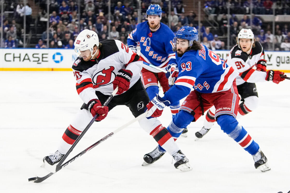 Lightning outscore their problems in OT win over Devils