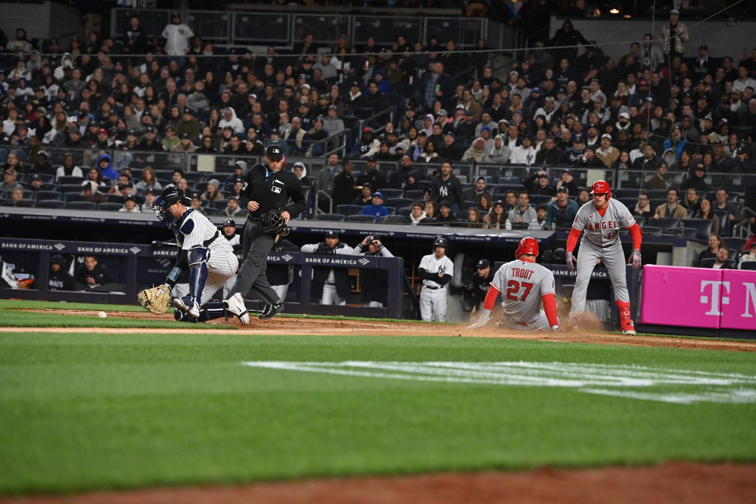 Los Angeles Angels Mike Trout slides into home in the fourth inning during a game between the Yankees and Angels on April 18, 2023.