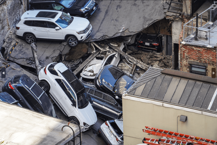 The roadbed on the garage's roof caved in