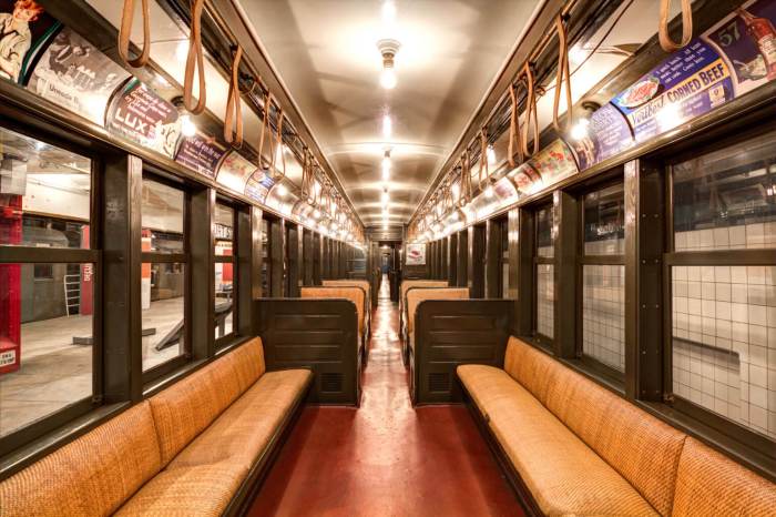 The interior of the Transit Museum's City Car, complete with old-timey ads