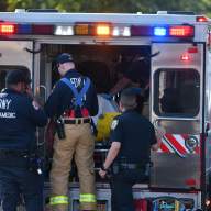 FDNY paramedics load an ambulance