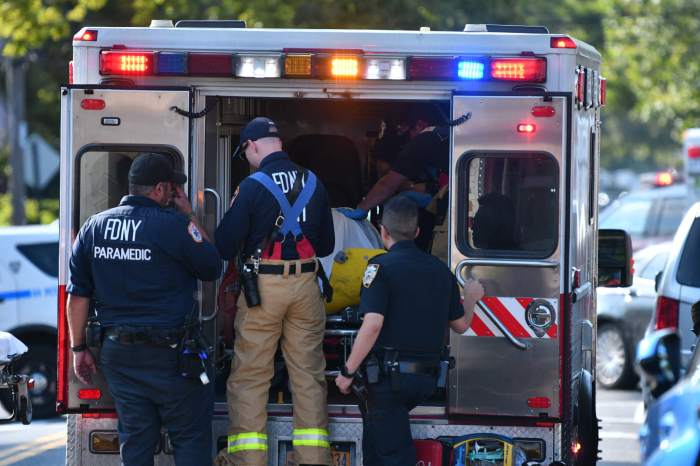 FDNY paramedics load an ambulance