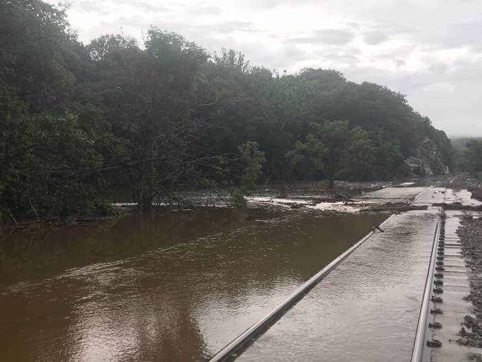 Floodwaters inundated Hudson Line tracks and partially washed away stone foundations