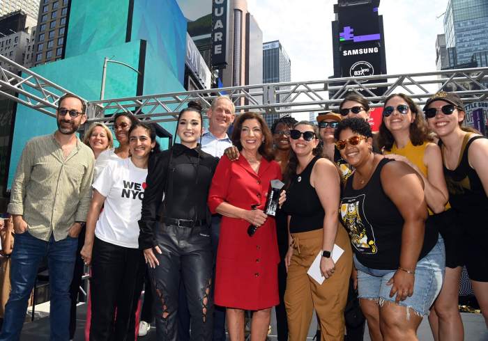 Brass Queens pose with Gov. Hochul and their Riders' Choice Award