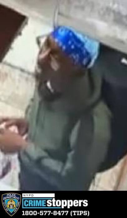 This man, seen on a surveillance footage, is sought by police for punching an MTA employee at a Bronx subway station.