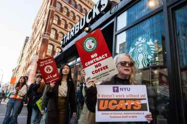 Starbucks baristas strike outside the Starbucks in Astor Place demanding fair pay and better working condidtions.