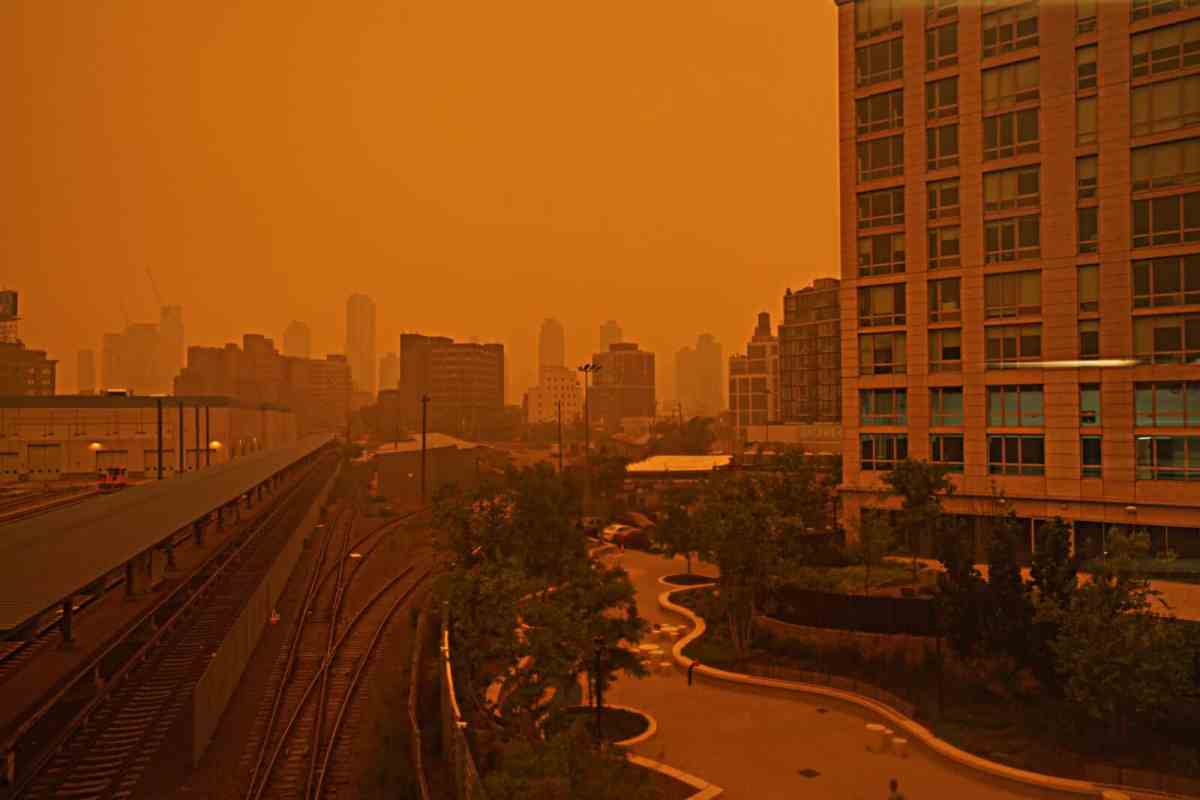 City blanketed in orange haze from wildfire smoke during summer of 2023