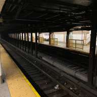 MTA platform railings at Washington Heights subway station