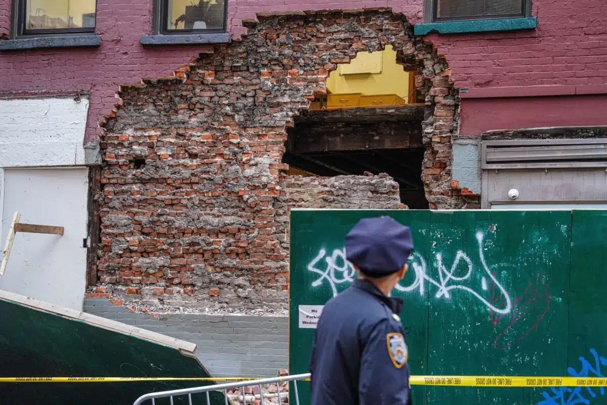 The brick facade of a building in Little Italy fell on Wednesday afternoon.