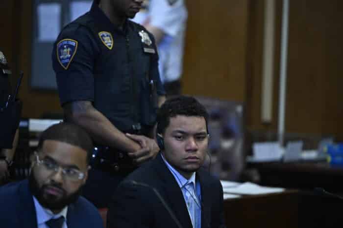 Yorman Reveron, 24, is accused of throwing two NYPD officers to the ground during the Times Square melee.