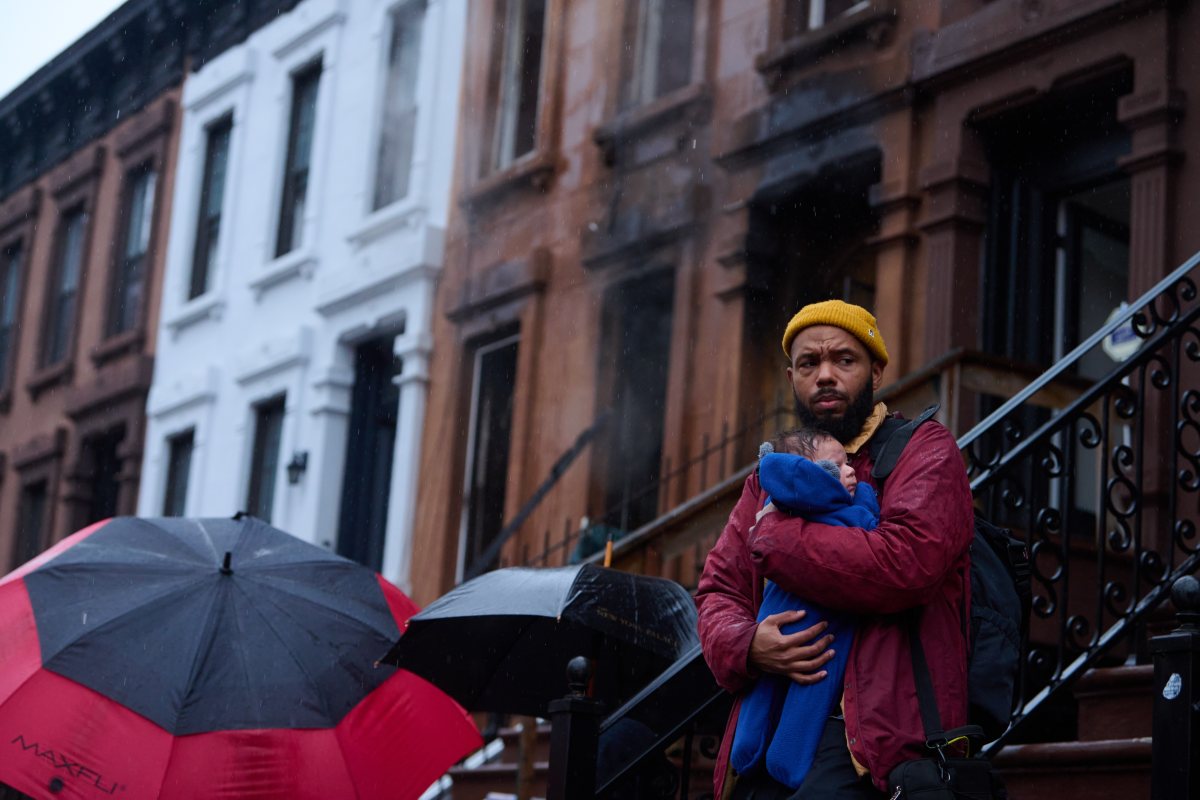 A man holding his baby