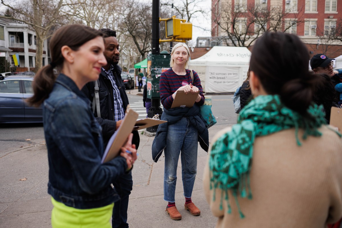 Volunteers gather to petition against Mayor