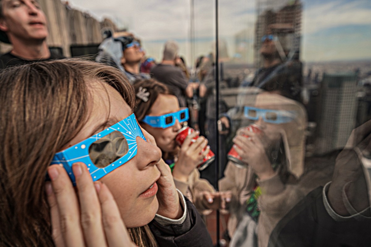 people all around New York State Monday gathered to watch the highly anticipated solar eclipse