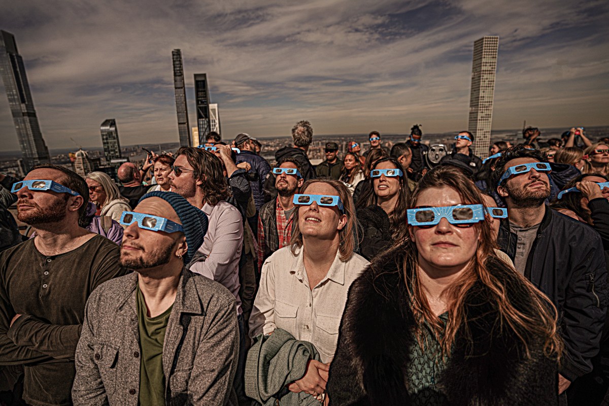 people all around New York State Monday gathered to watch the highly anticipated solar eclipse