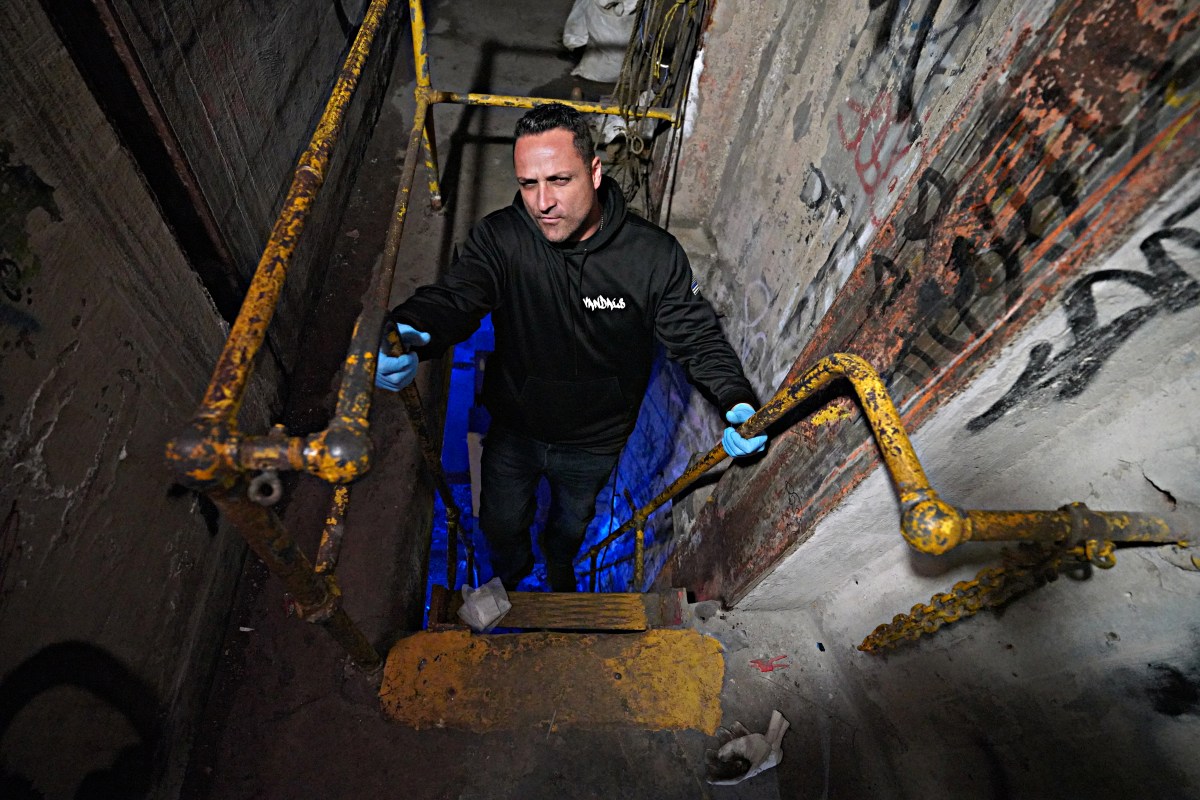 Donning blue latex gloves and led by Gerardo Meola, the team carefully descended ladders into the darkness below street level