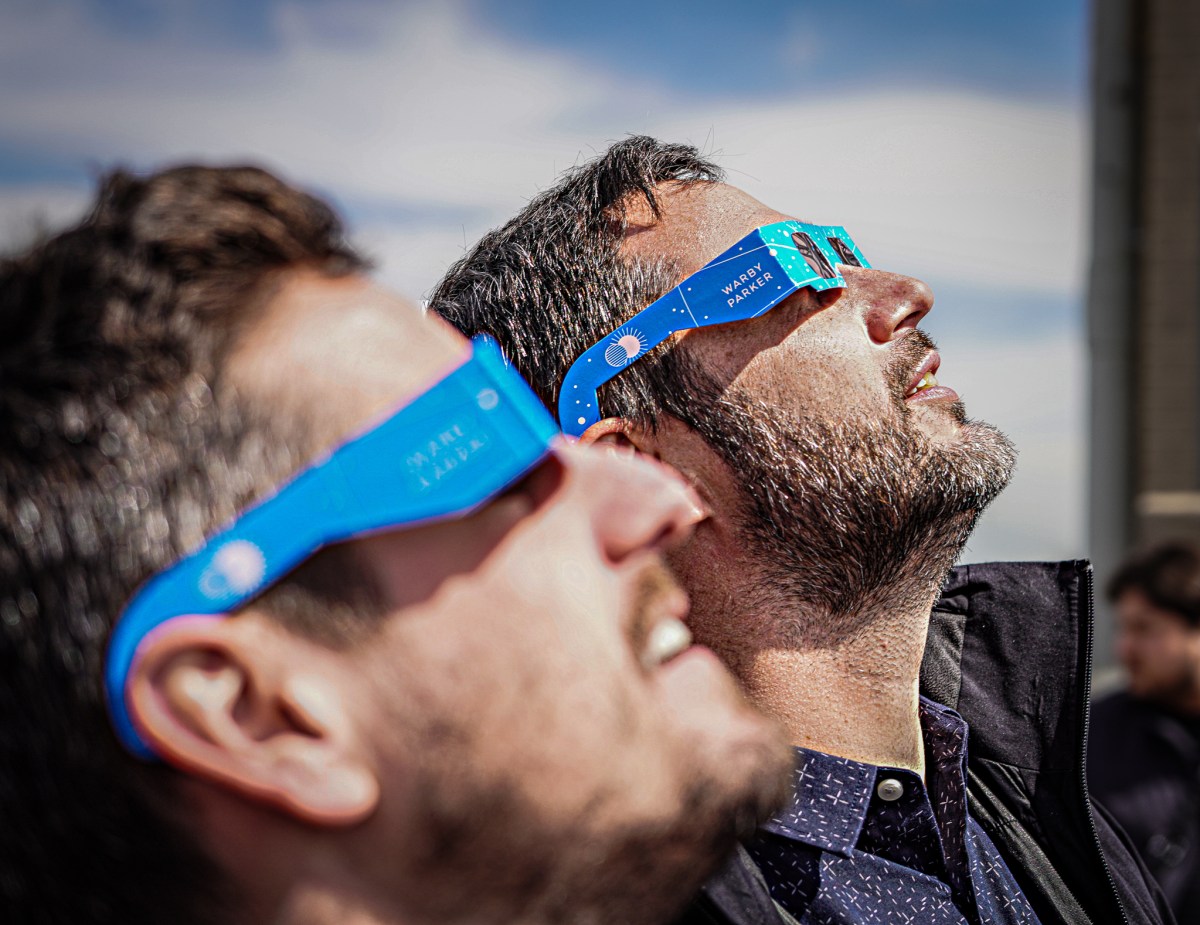 people all around New York State Monday gathered to watch the highly anticipated solar eclipse