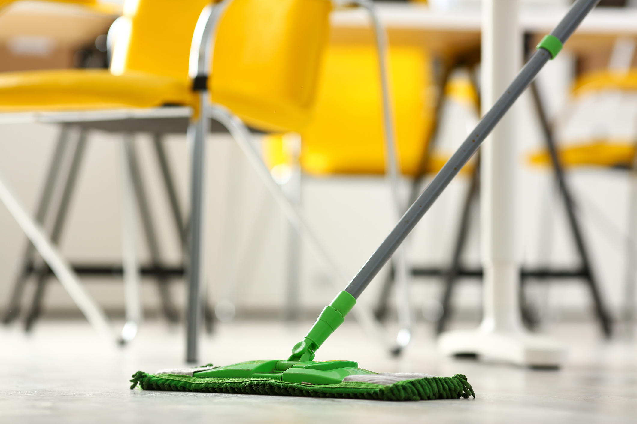 Green plastic mop