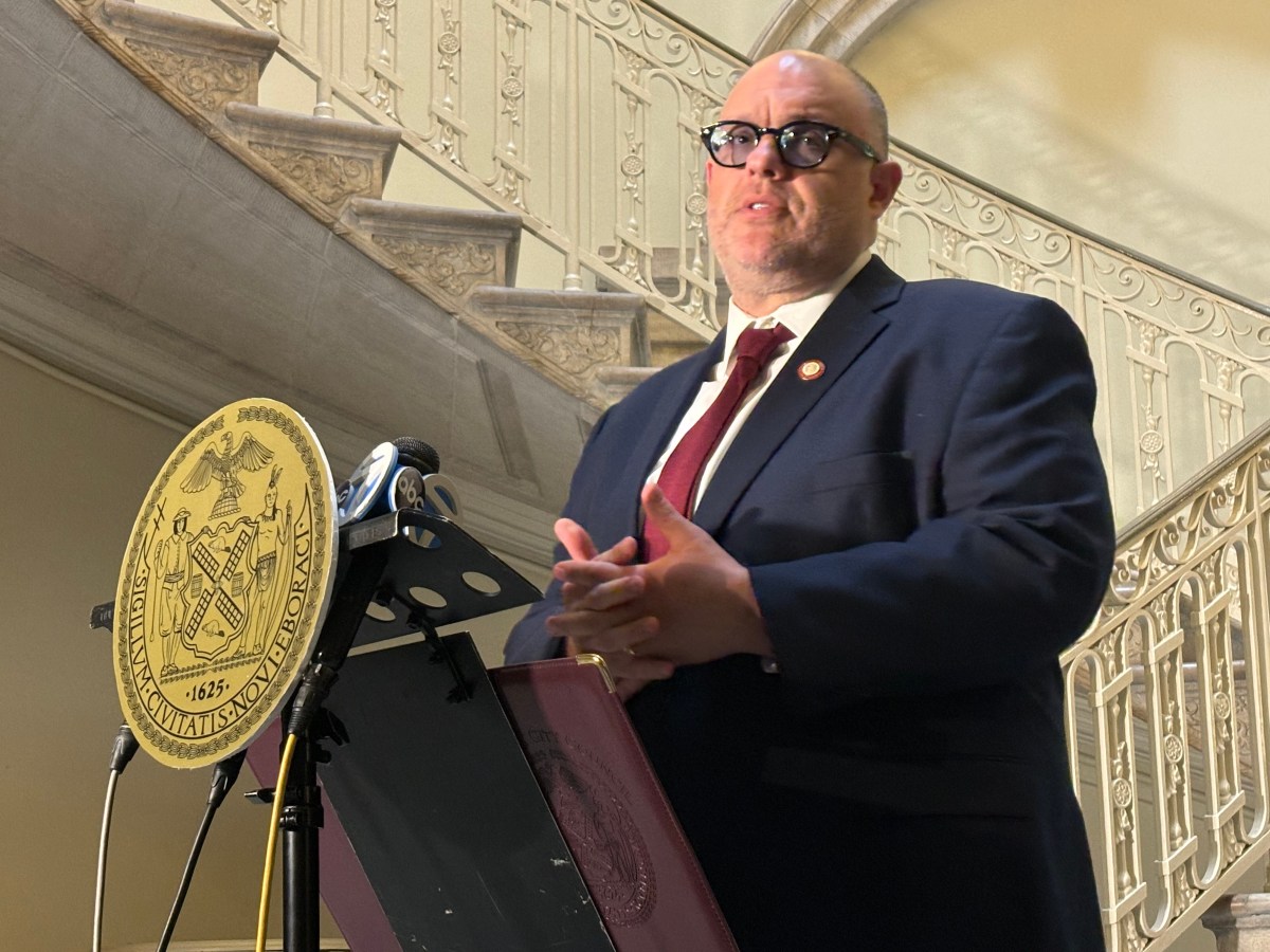 City Council Finance Chair Justin Brannan speaks to reporters