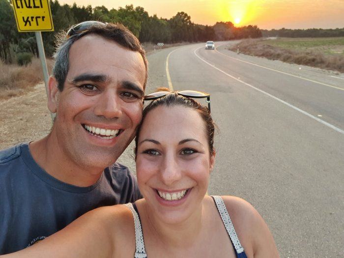 photo of a man and woman in daytime, the man is a hostage in Gaza amid the Israel - Hamas war