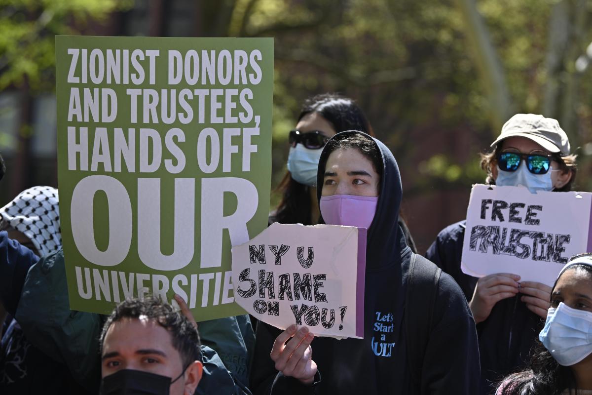 Part of the NYU campus blocked with plywood following demonstrations