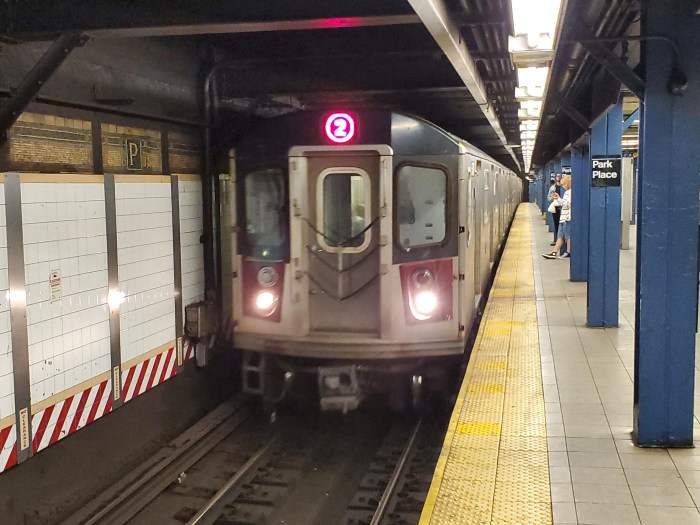 NYC Transit subway train pulls into station