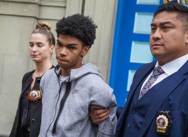 Police cuffed Friday 19-year-old Henry Thomas who allegedly gunned down a 16-year-old boy outside a school in Soho last week, authorities said.