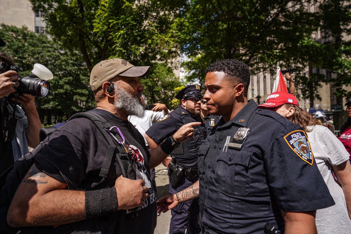 Cops hurriedly moving to break up the scuffles