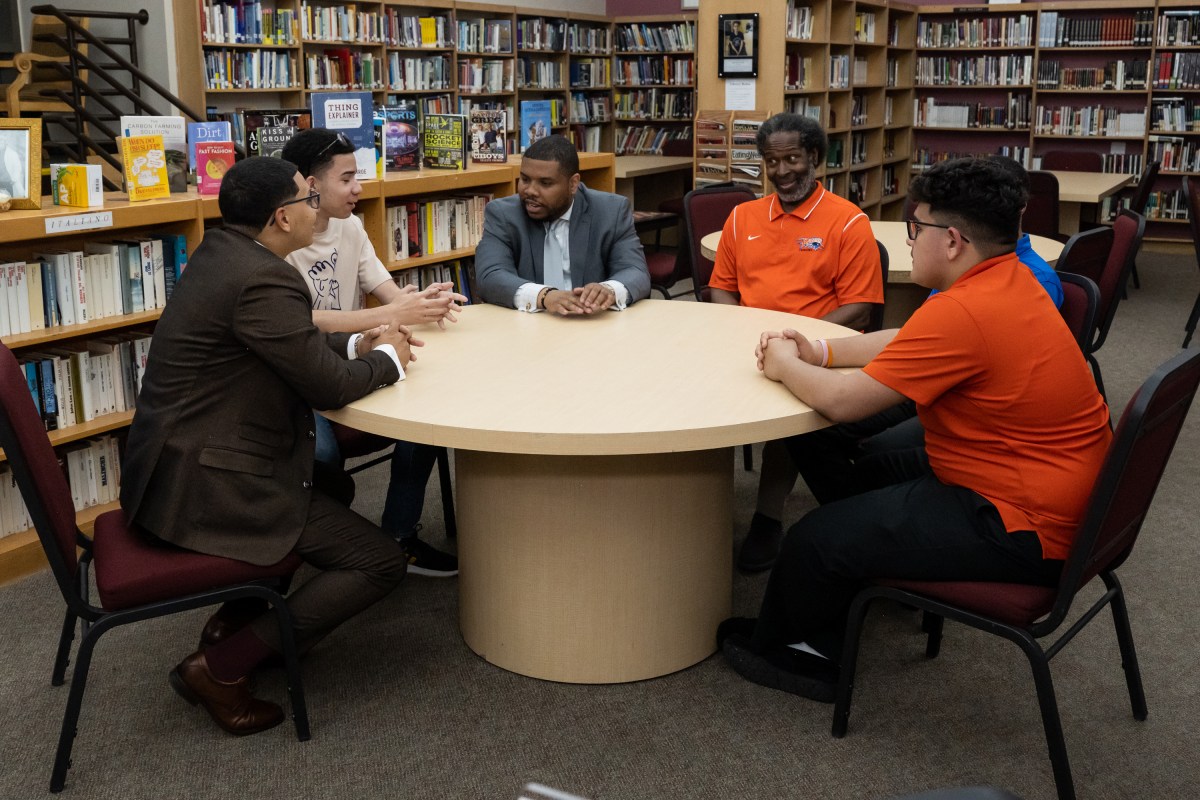 NYPD Detective Angel Familia and NYPD Assistant Commissioner of Community Affairs Bureau Alden Foster visit their alma mater, St. Raymond High School for Boys