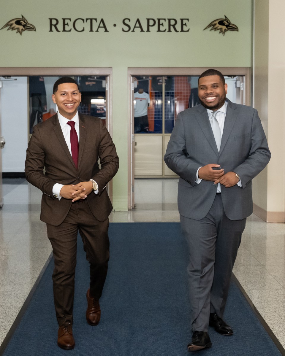 NYPD Detective Angel Familia and NYPD Assistant Commissioner of Community Affairs Bureau Alden Foster visit their alma mater, St. Raymond High School for Boys