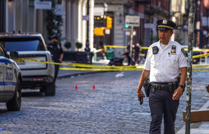 Cop stands guard where SoHo shooter shot and killed man