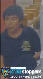 surveillance photo man in blue shirt wanted for forcible touching in Mahattan