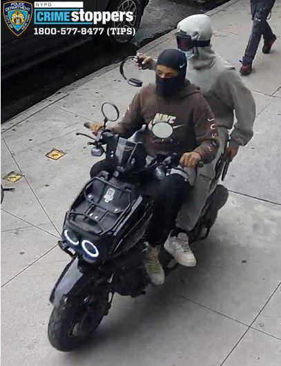 robbery suspects wearing masks on a moped