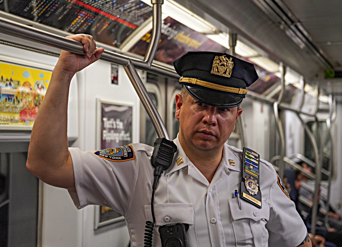 An NYPD captain rides the subway