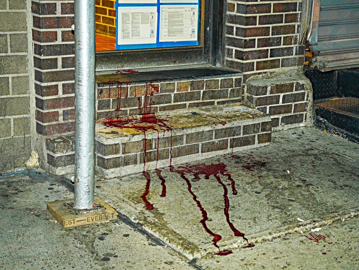 Blood covering the Manhattan stabbed crime scene