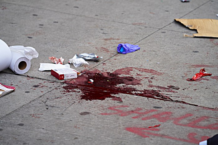 Blood on the sidewalk of East Village after stabbing