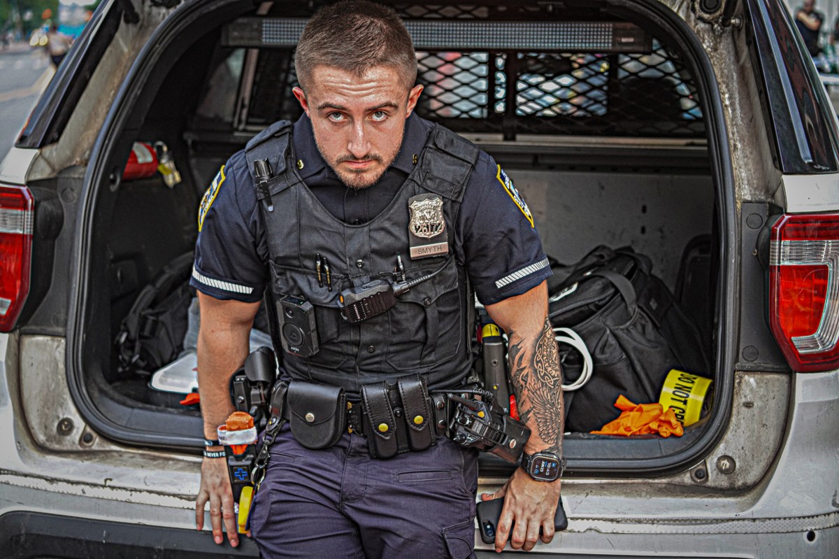 NYPD officer looking at camera