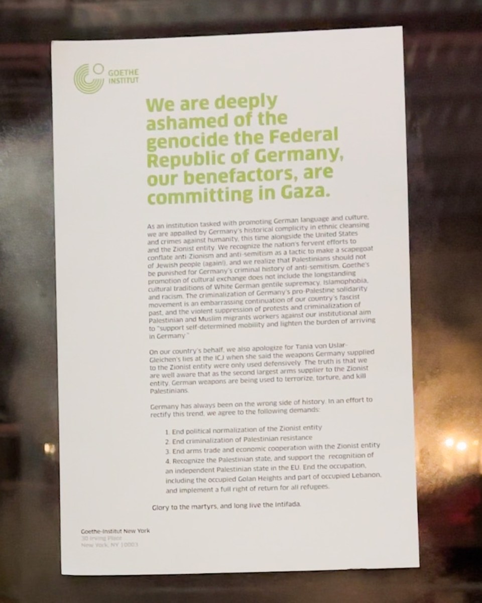 The protesters glued a letter to the German Consulate's glass doors demanding an apology