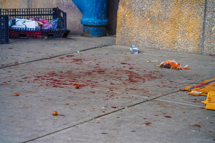 Blood splattered at Chinatown scene where man was stabbed