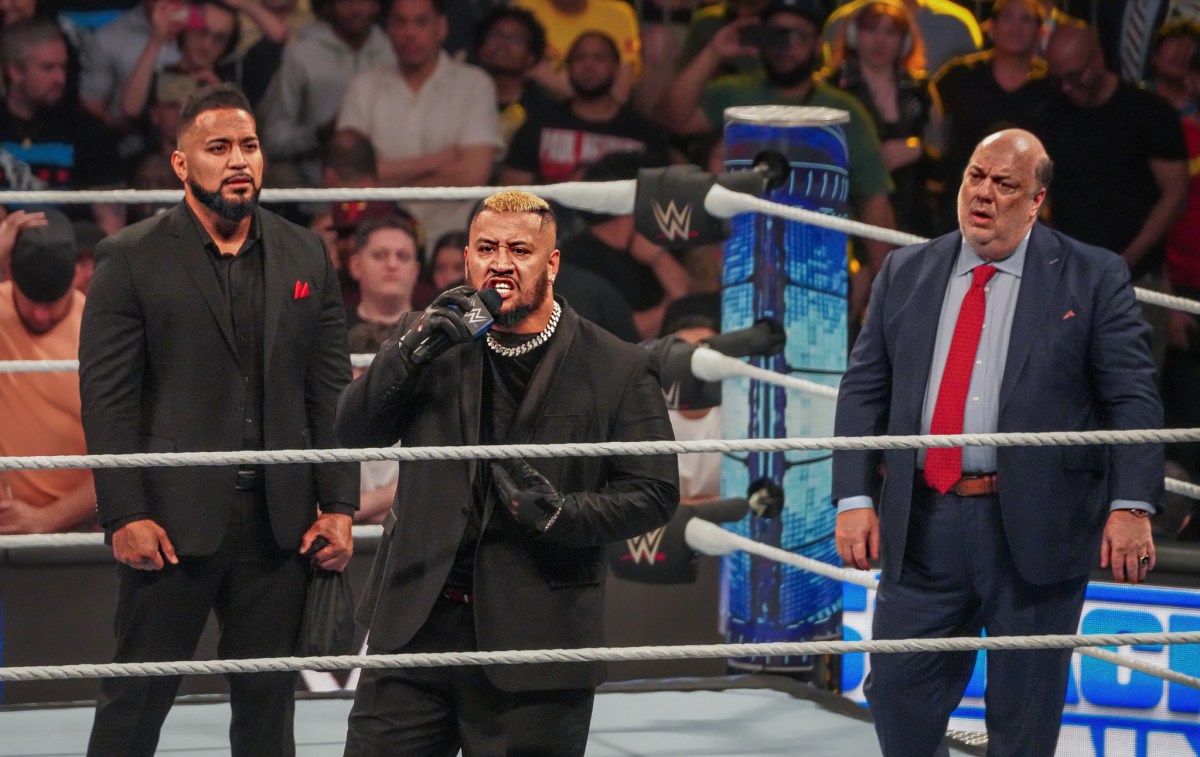 WWE star Solo Sikoa talks with Paul Heyman in background at MSG