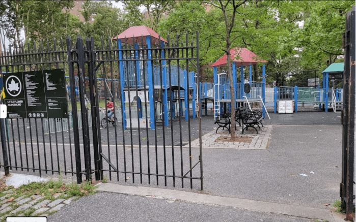 Little Flower Playground with climbing equipment and benches in Manhattan