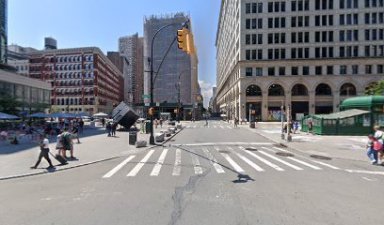 intersection in the East Village of Manhattan, showing a crosswalk