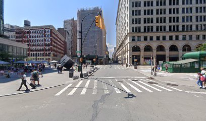 intersection in the East Village of Manhattan, showing a crosswalk