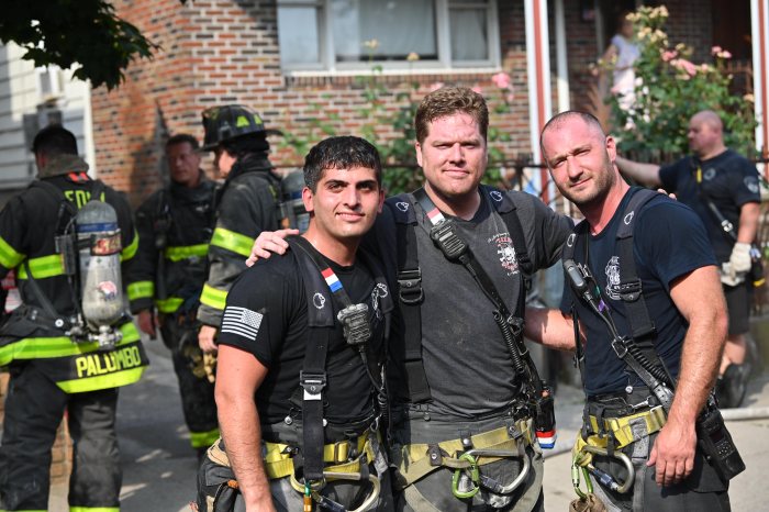 Brooklyn probationary firefighter with colleagues after saving man